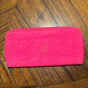 Kipling pink canvas zip around organizer wallet